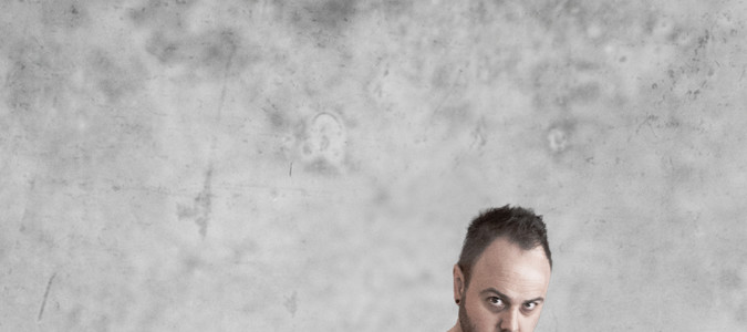 Sundergeist member promo photo Ric standing hands in pockets